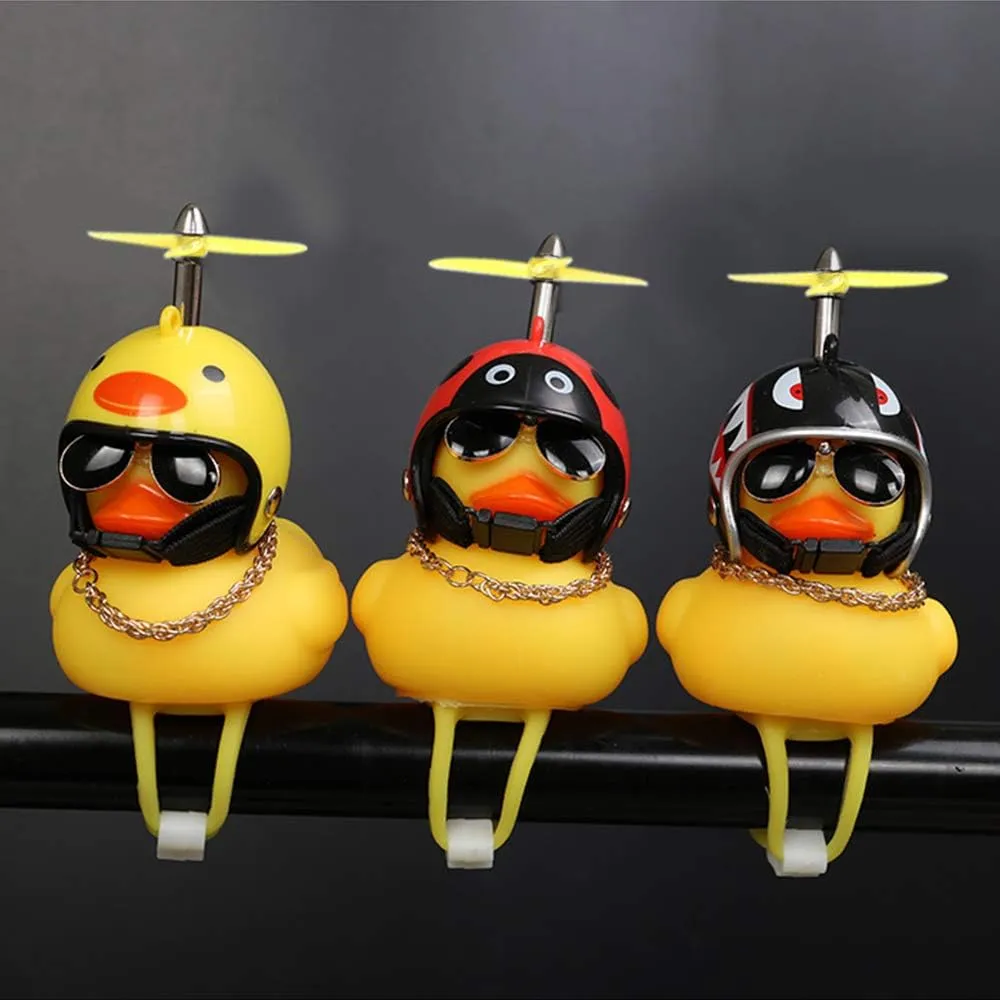 wonuu Rubber Duck Toy Car Ornaments Yellow Duck Car Dashboard Decorations Squeeze Duck Bicycle Horns with Propeller Helmet